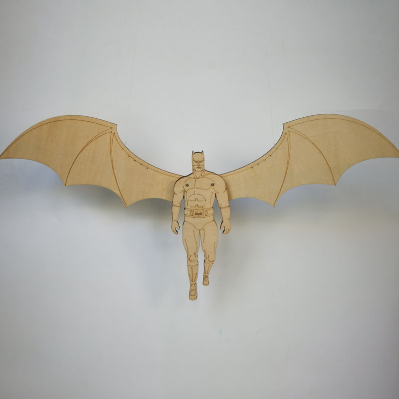 Wooden flying batman.-gravity linkage